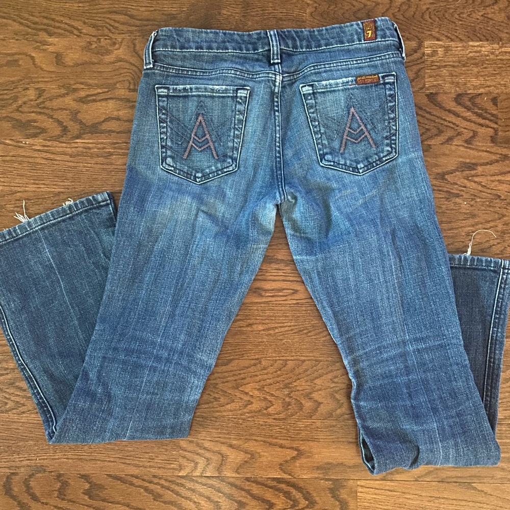 Seven for All Mankind jeans.
